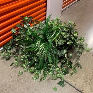 Artificial fake plant in basket weave planter